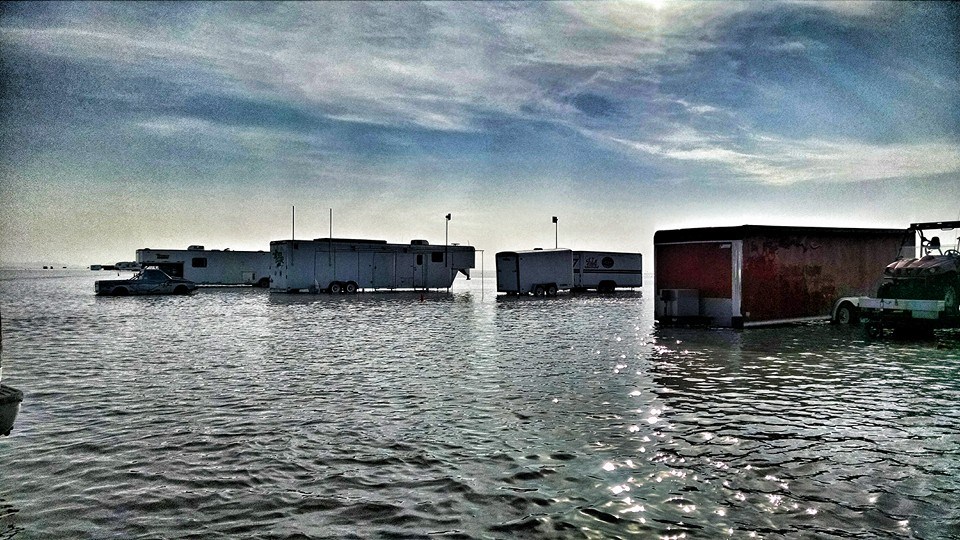 SpeedWeek Trailers and Operations Area is submerged from rains